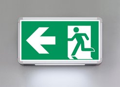 Rettungszeichenleuchte in Dauerschaltung nach DIN EN ISO 7010